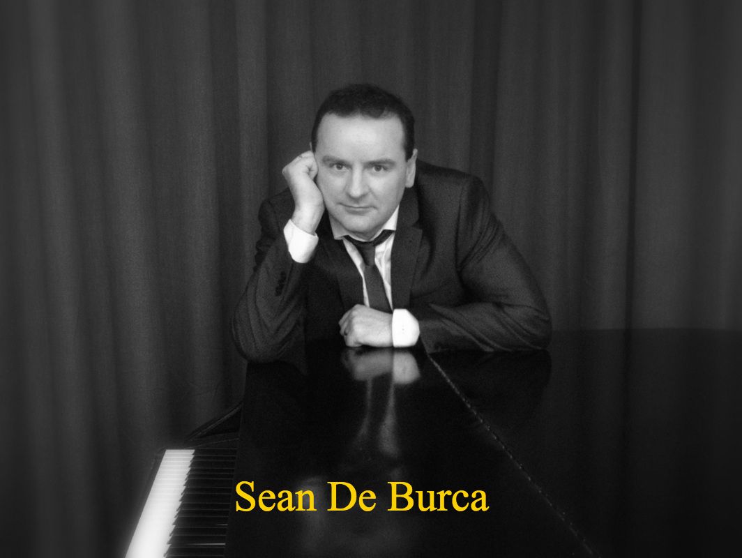 Photo of sean De Burca at a Piano